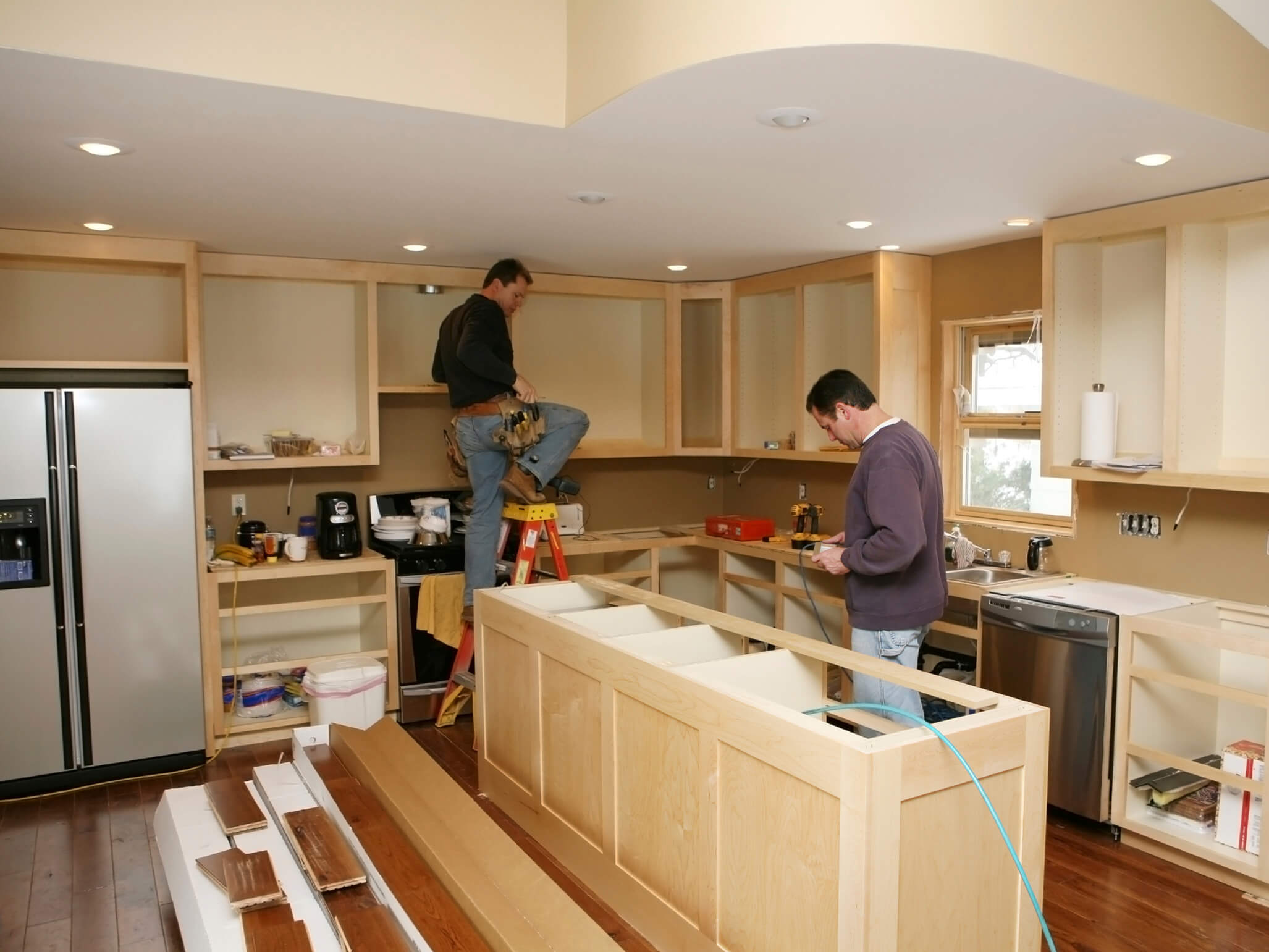 Nevada home with contractors renovating kitchen
